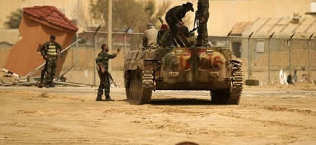 Rebels fight Gaddafi’s army in the eastern parts