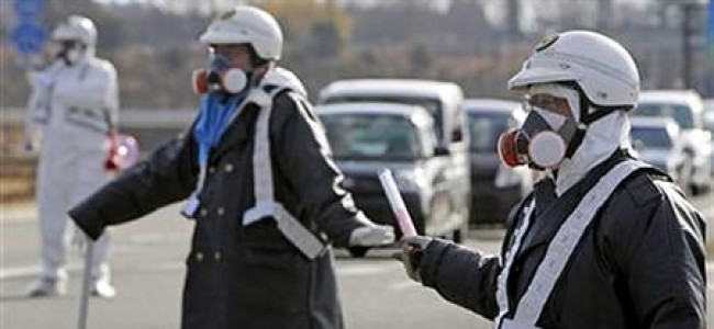 After increased radiation Fukushima workers evacuated